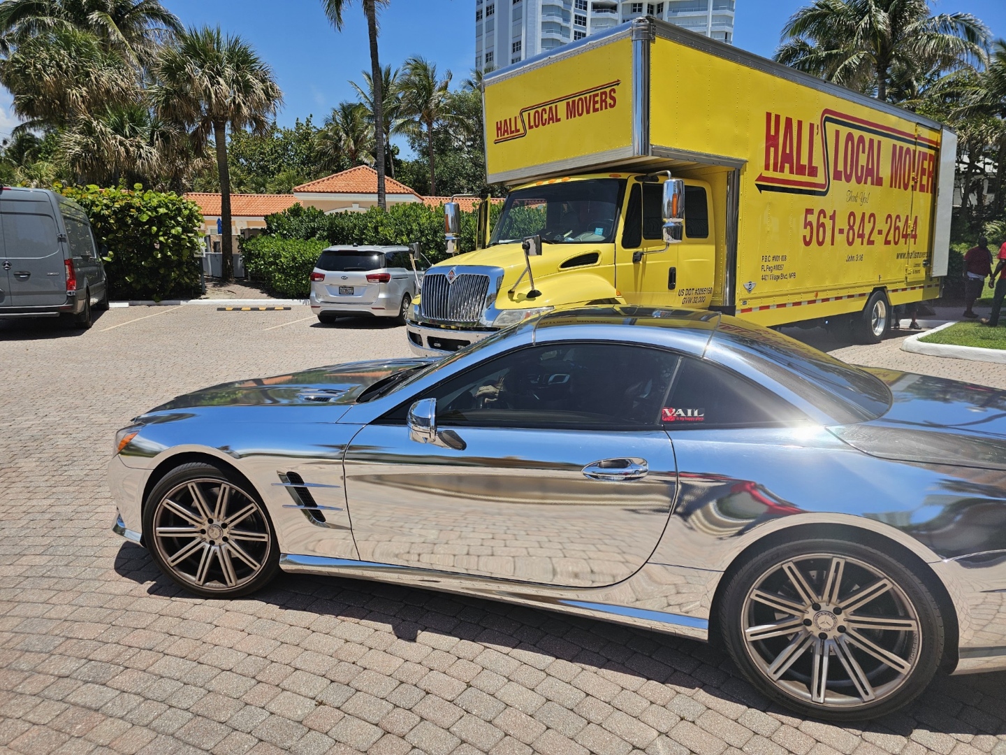 Professional moving crew wrapping furniture
